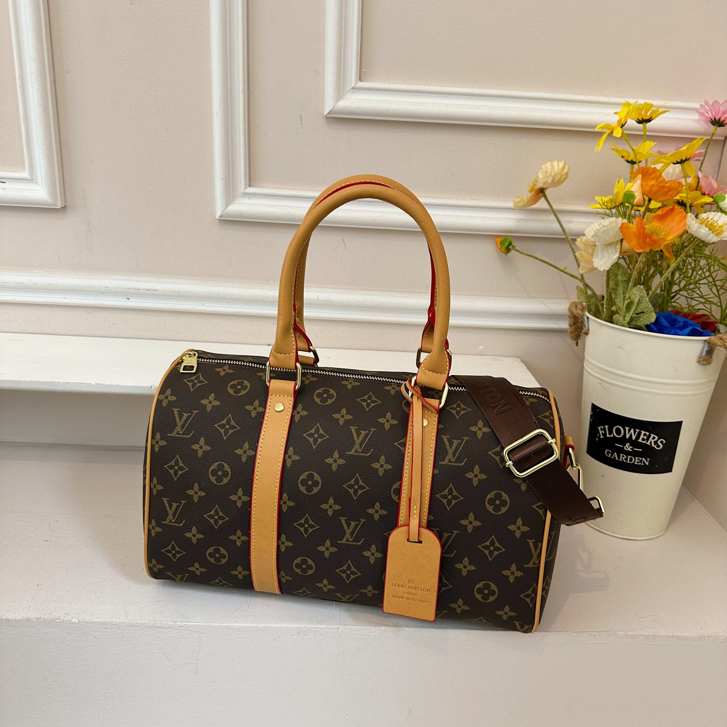 Louis Vuitton Keepall Compact